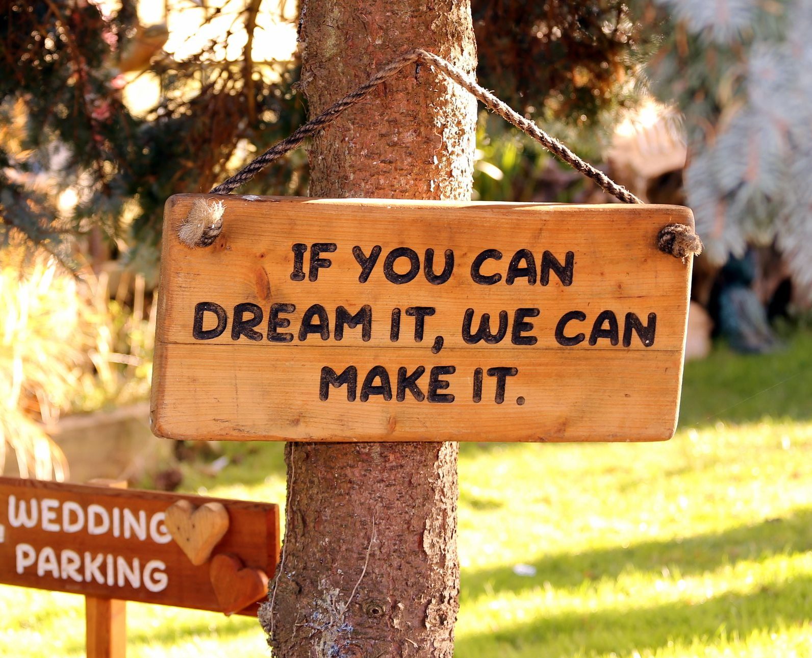 Handcrafted wooden house sign