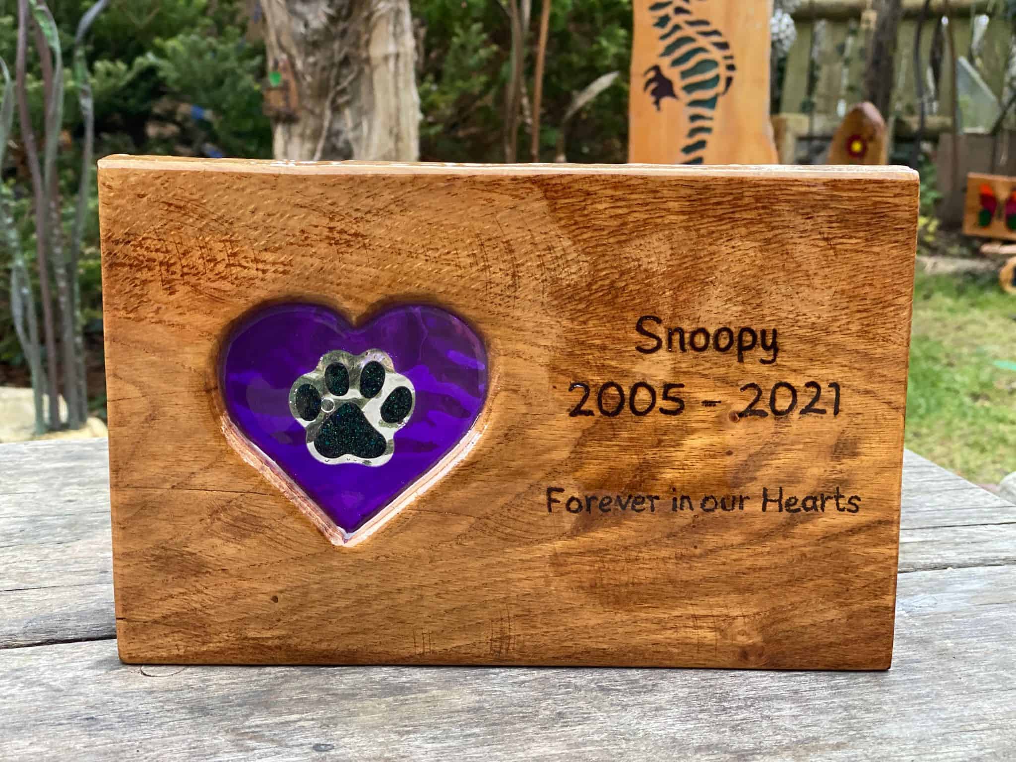 Paw memorial in carved English oak